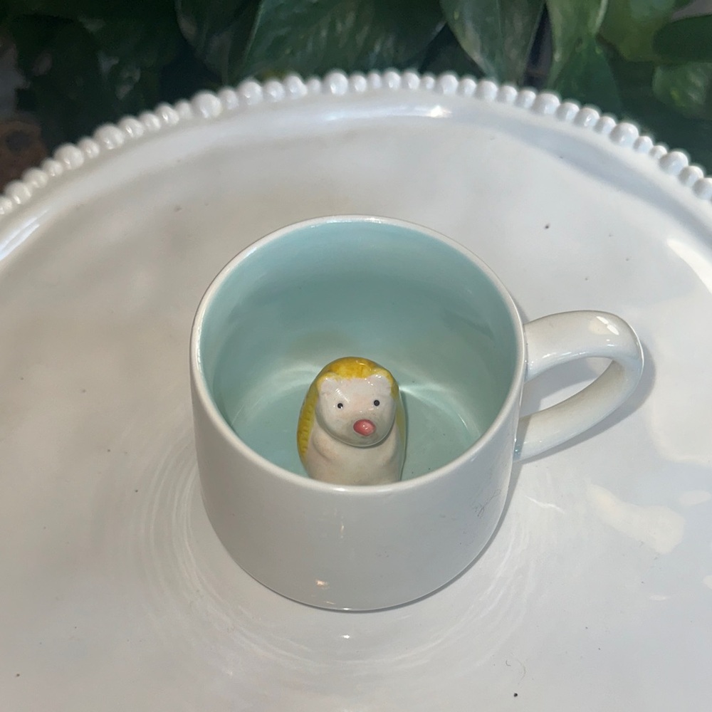 Charming White and Blue Mug with Hedgehog Design